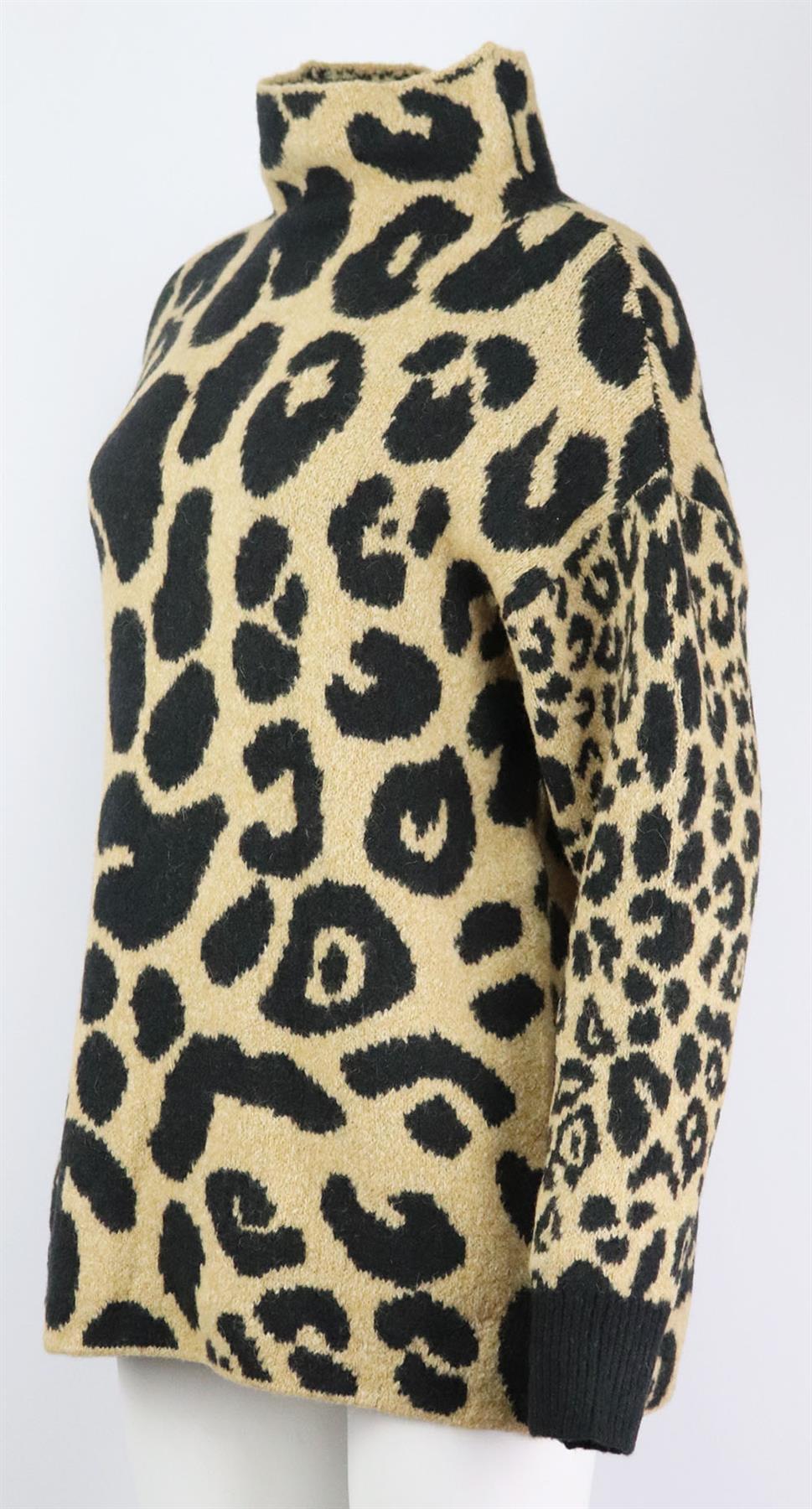 This sweater by Stella McCartney is spun in Italy from a blend that includes intarsia-knitted leopard pattern cotton and fluffy alpaca, it has a mock neck and dropped shoulders. Beige and black cotton, alpaca, polyamide and elastane-blend. Slips on.