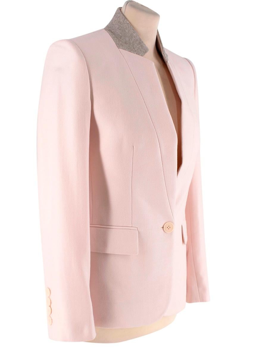  Stella McCartney Light Pink Pique Single Breasted Blazer
 

 - Minimal and chic singled breasted blazer in a pale pink textured pique material, with single button closure and turned up, notched collar featuring a contrasting grey wool flannel band
