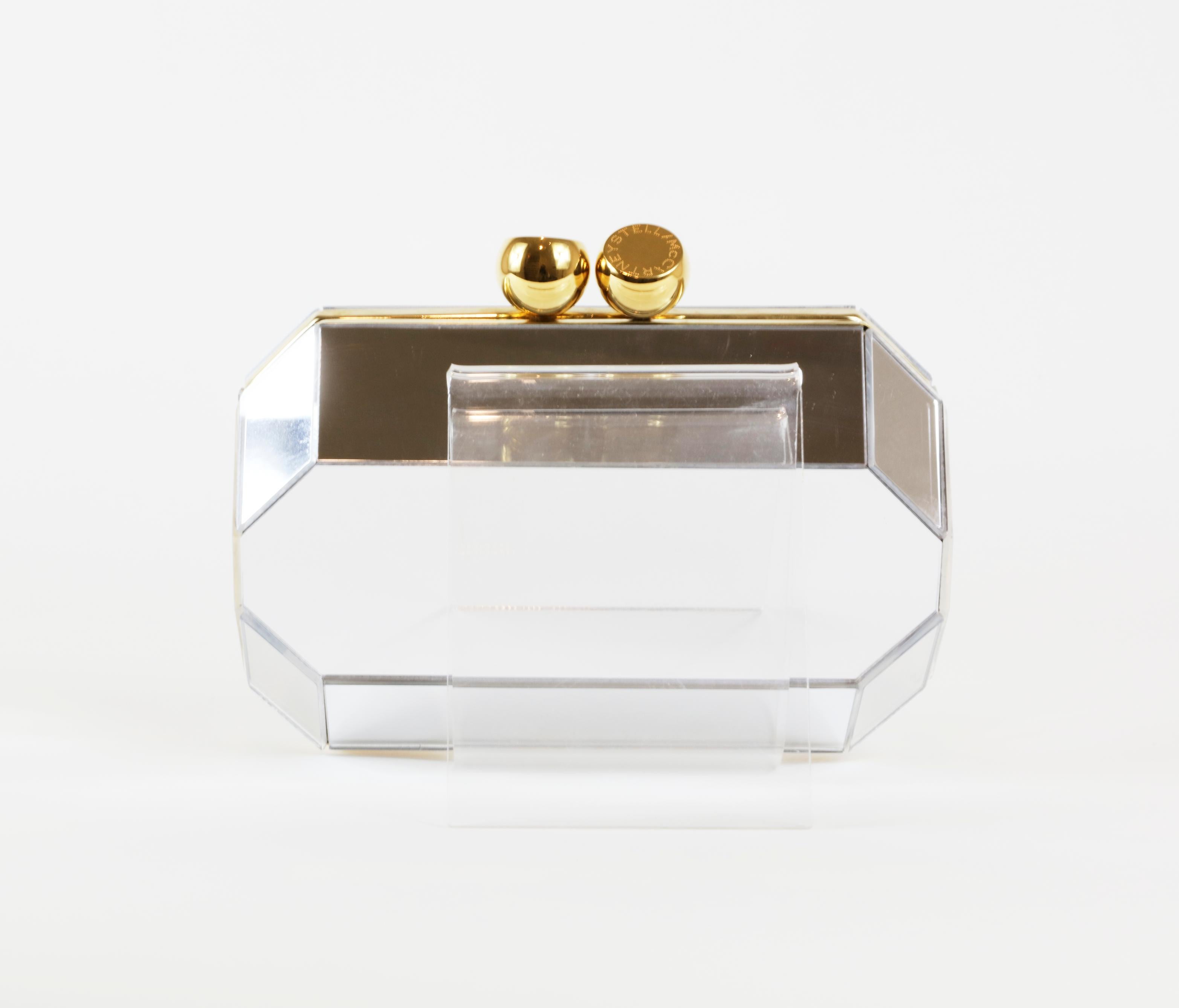 Pochette Stella McCartney Lucia in plexiglass a specchio
Ferramenta dorata
7,5