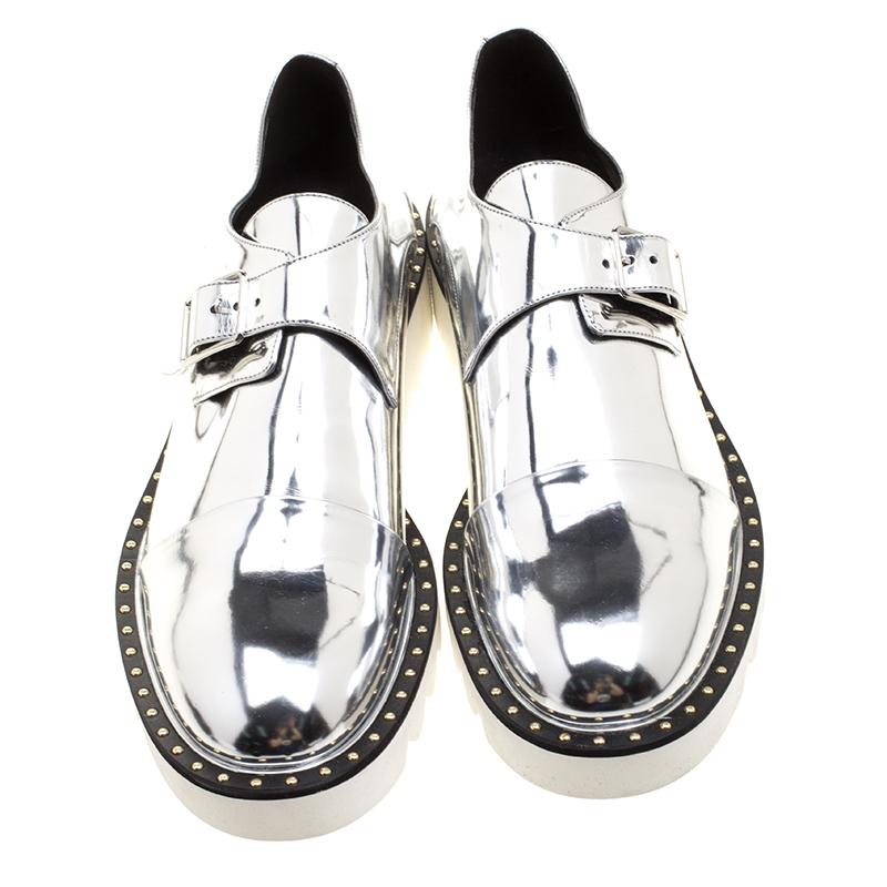 Stella McCartney proves her high style and unique fashion taste with these metallic silver flats. They are brimming with exquisite details like the faux leather exterior with the monk straps and the thick platforms. Grab this pair today and let it