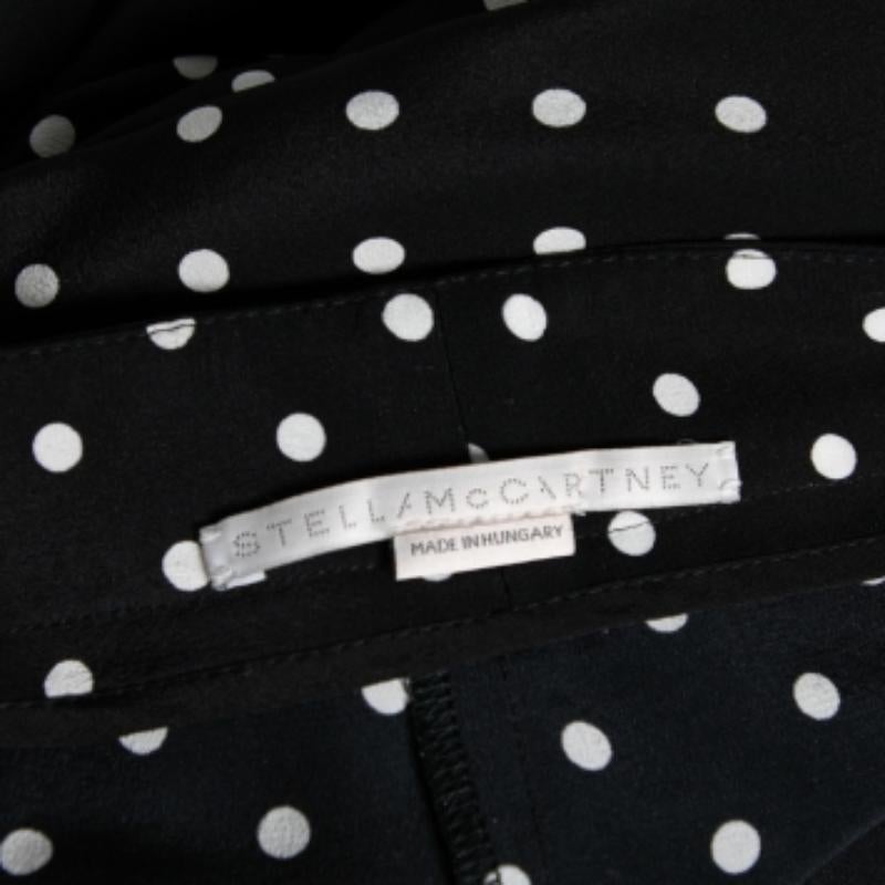 This pair of wide-leg pants from Stella McCartney strike the right balance between classic elegance and modern high fashion. The monochrome polka-dotted piece is beautiful and has been cut skillfully from silk. A pair meant for daily wear, it will