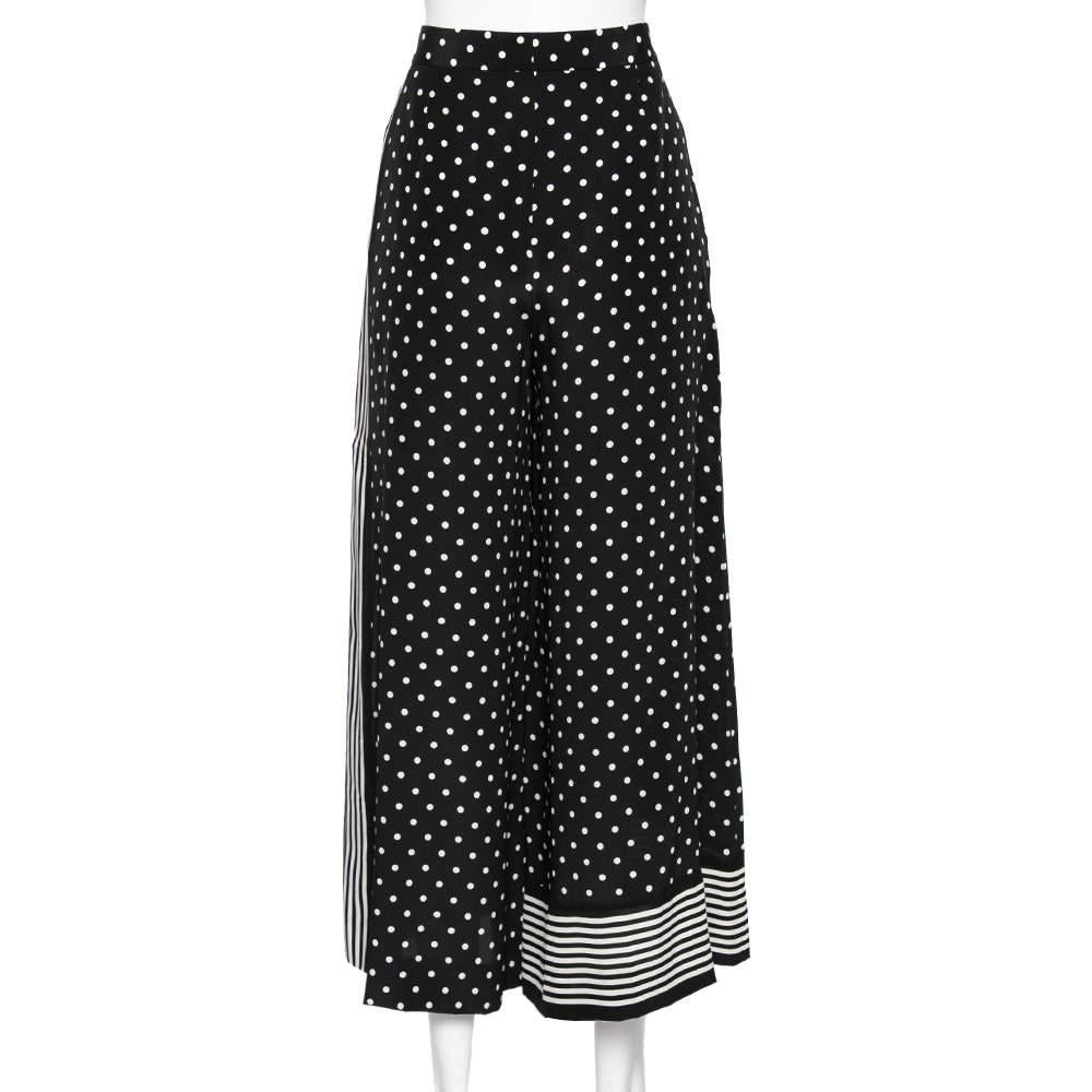 This pair of wide-leg pants from Stella McCartney strike the right balance between classic elegance and modern high fashion. The monochrome polka-dotted piece is beautiful and has been cut skillfully from silk. A pair meant for daily wear, it will