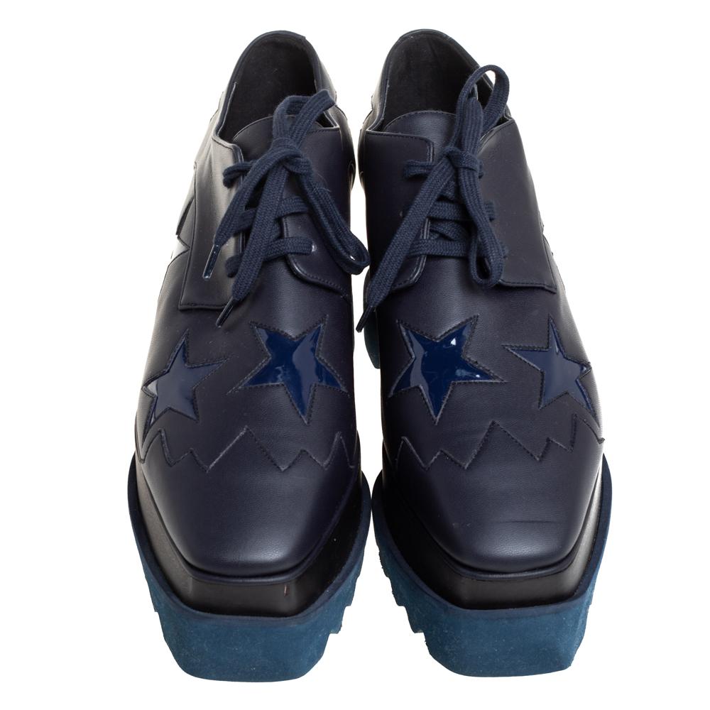 Stella McCartney exudes her high style and unique fashion taste with these Elyse shoes. They are brimming with exquisite details like the star motifs on the faux leather exterior, the laces, and the thick platforms. Grab this pair today and let it