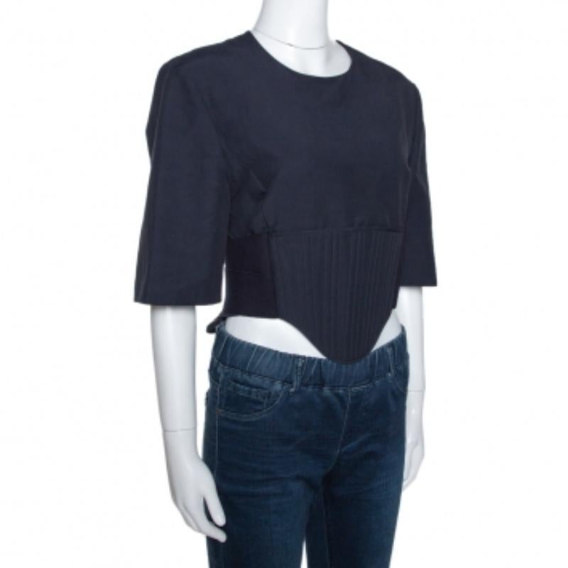 Incredibly designed this lavish Stella McCartney top will tempt you to instantly buy it. Exclusively styled and uniquely crafted, this smart navy blue top is for the modern women. Look your best when you pair this trendy corset top crafted from a