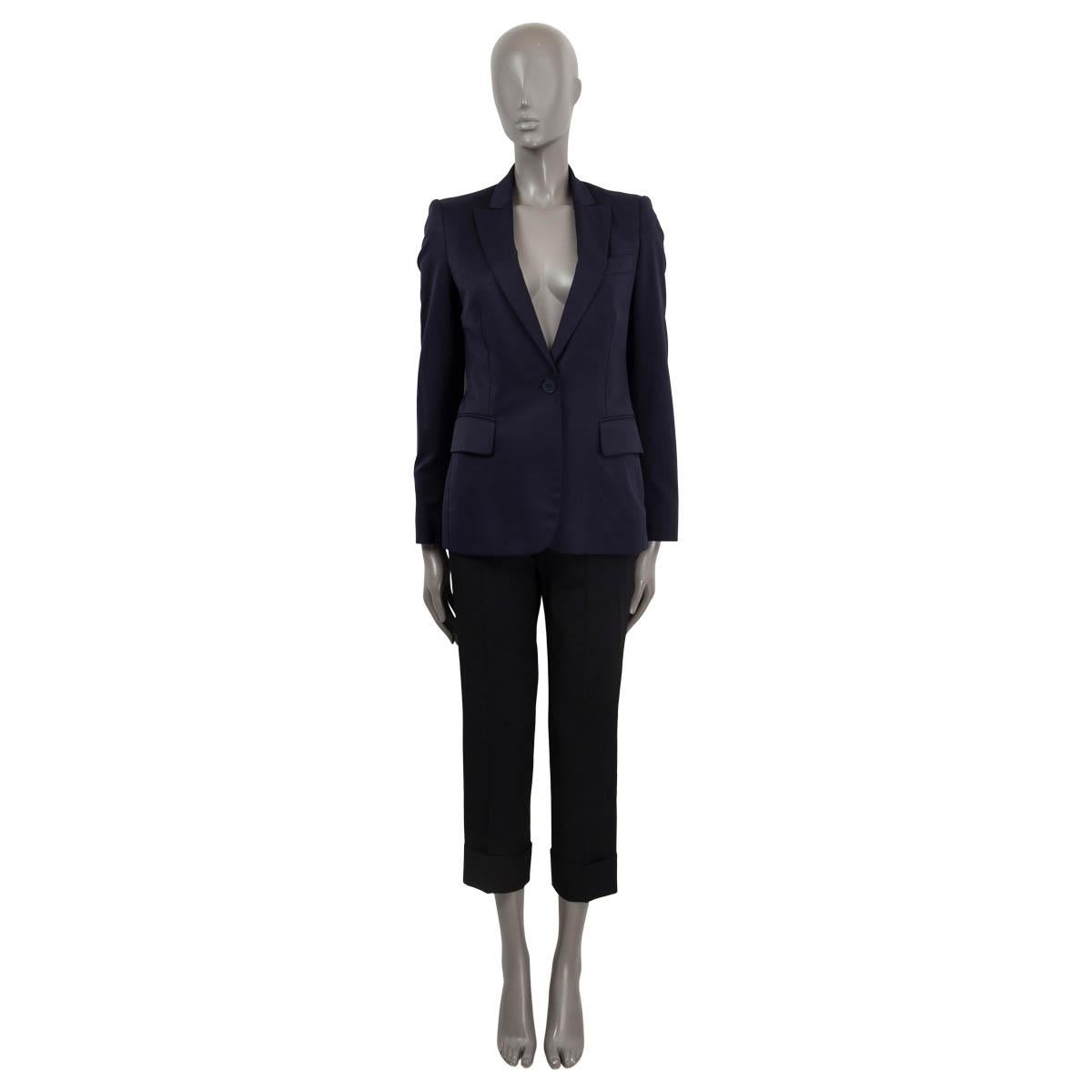 100% authentic Stella McCartney peak collar single button blazer in navy wool (100%), (rayon52%) and cotton (48%). Features buttoned cuffs, two flap pockets on the front and one chest pocket. Lined in blue rayon (100%). Has been worn and is in