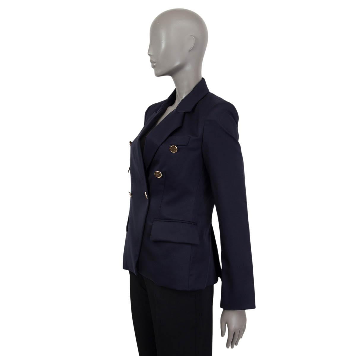 100% authentic Stella McCartney 'Robin' double breasted blazer in navy wool (100%). Features padded shoulders, a sewn shut chest pocket and two flap pockets on the front. Opens with two golden buttons on the front. Lined in navy viscose (52%) and