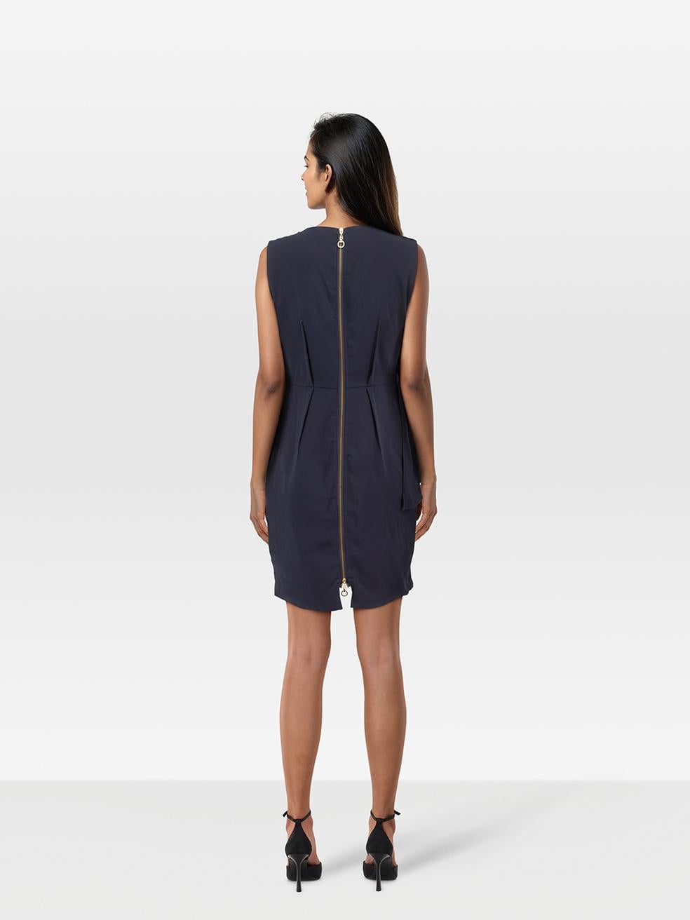 CONDITION is Very good. Minimal wear to the dress is evident. Marks on the front, back and under the right armpits. Plucks to the weave on the front right drape, front and back of this used Stella McCartney designer resale item. Marks may need