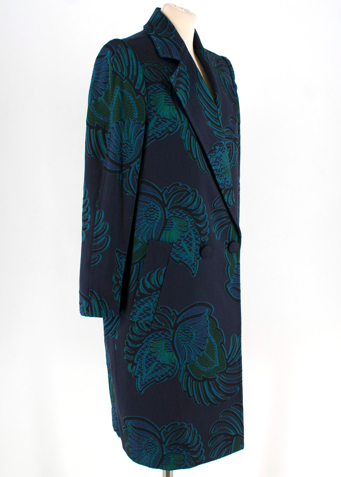 Stella McCartney Navy & Green Wool Coat

- navy wool coat 
- green and blue thread embellished
- lined
- button fastening to the middle 

Please note, these items are pre-owned and may show some signs of storage, even when unworn and unused. This is