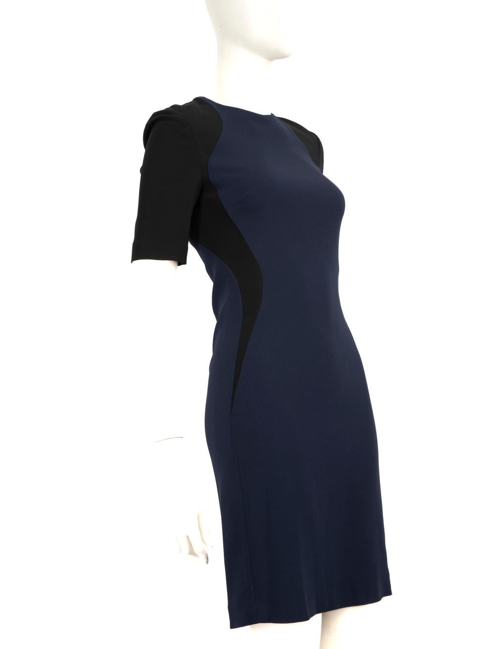 CONDITION is Good. Minor wear to dress is evident. The brand label has a few small holes in. There are some abrasions and loss of paint from the zip pull tag on this used Stella McCartney designer resale item.
 
 
 
 Details
 
 
 Navy
 
 Rayon
 
