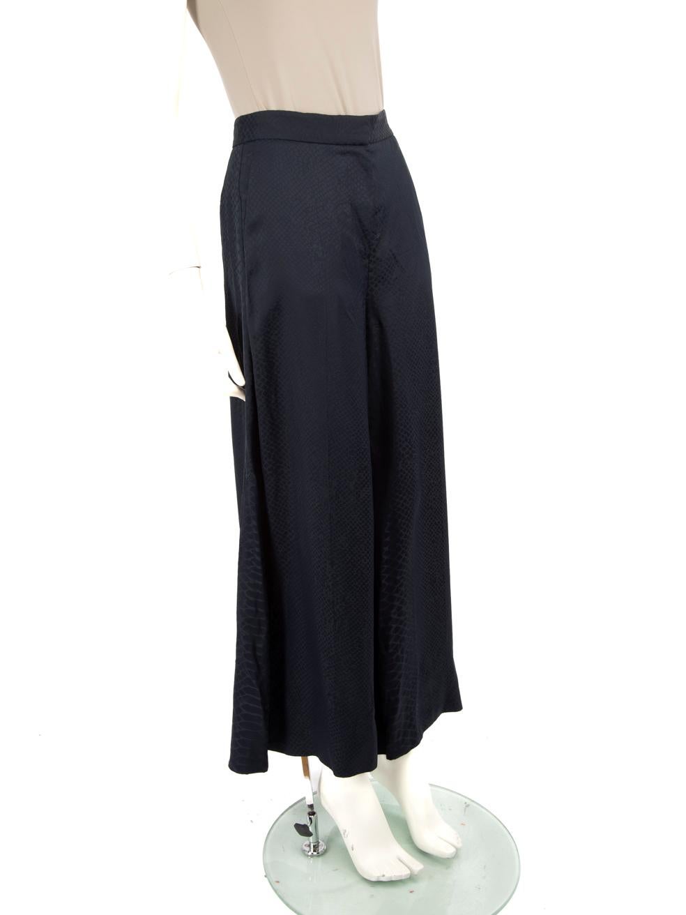 CONDITION is Very good. Hardly any visible wear to the trousers is evident on this used Stella McCartney designer resale item.
 
 Details
 
 
 Navy
 
 Viscose
 
 Trousers
 
 Wide-leg
 
 Snakeskin patterned
 
 2x Front pockets
 
 1x Back pocket
 
