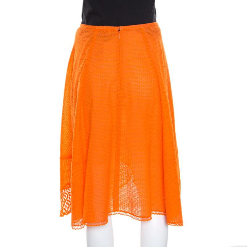 Draw everyone's attention with this pretty and well-designed skirt from Stella McCartney. Made from blended fabric, it looks bold and alluring with its mesh and lace inserts. Face this summer with a fun and bright getup by wearing this pretty orange