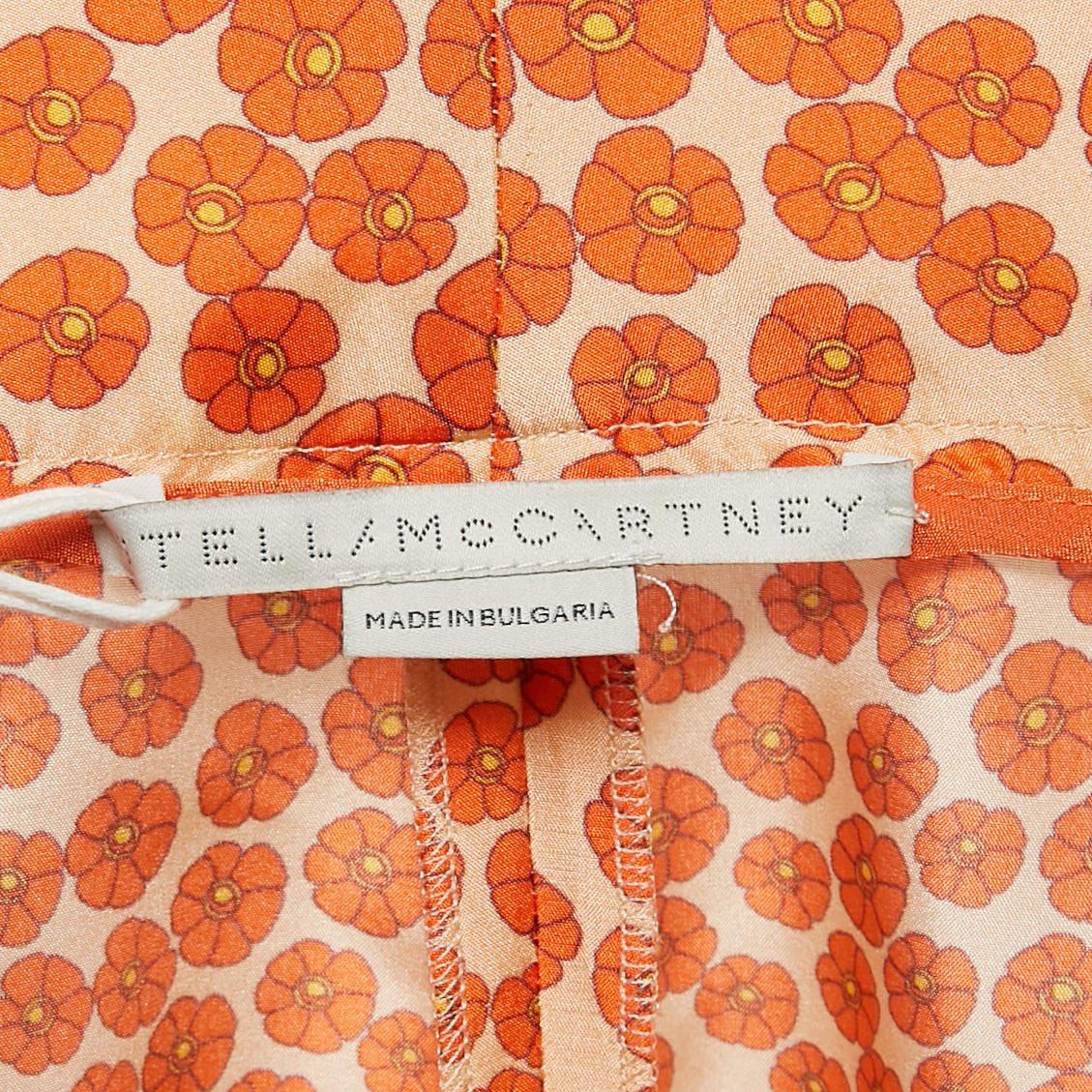 Stella McCartney - Pantaloni in seta con stampa floreale arancione S In condizioni Nuovo in vendita a Dubai, Al Qouz 2