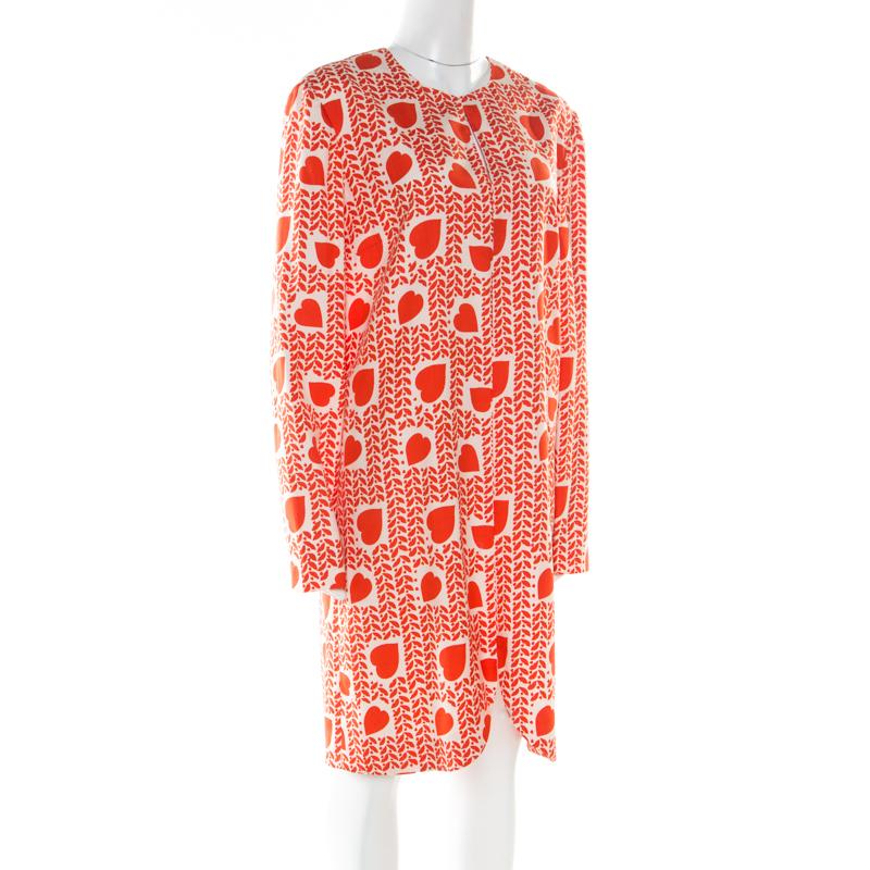 Kick-start your weekend on a lively note with this exquisite orange creation. This silk dress brings long sleeves, a back zipper and prints of hearts all over. This Stella McCartney dress will be a major win this season.

Includes: The Luxury Closet