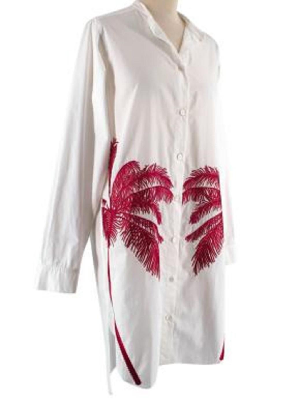 Stella McCartney Embroidered Long White Shirt

- Button fastening
- Collarless
- Long sleeved
- Red Palm Embroidery
- Buttoned cuffs
- Side vents

Material
100% Cotton

Gentle dry clean

Made in Italy

PLEASE NOTE, THESE ITEMS ARE PRE-OWNED AND MAY