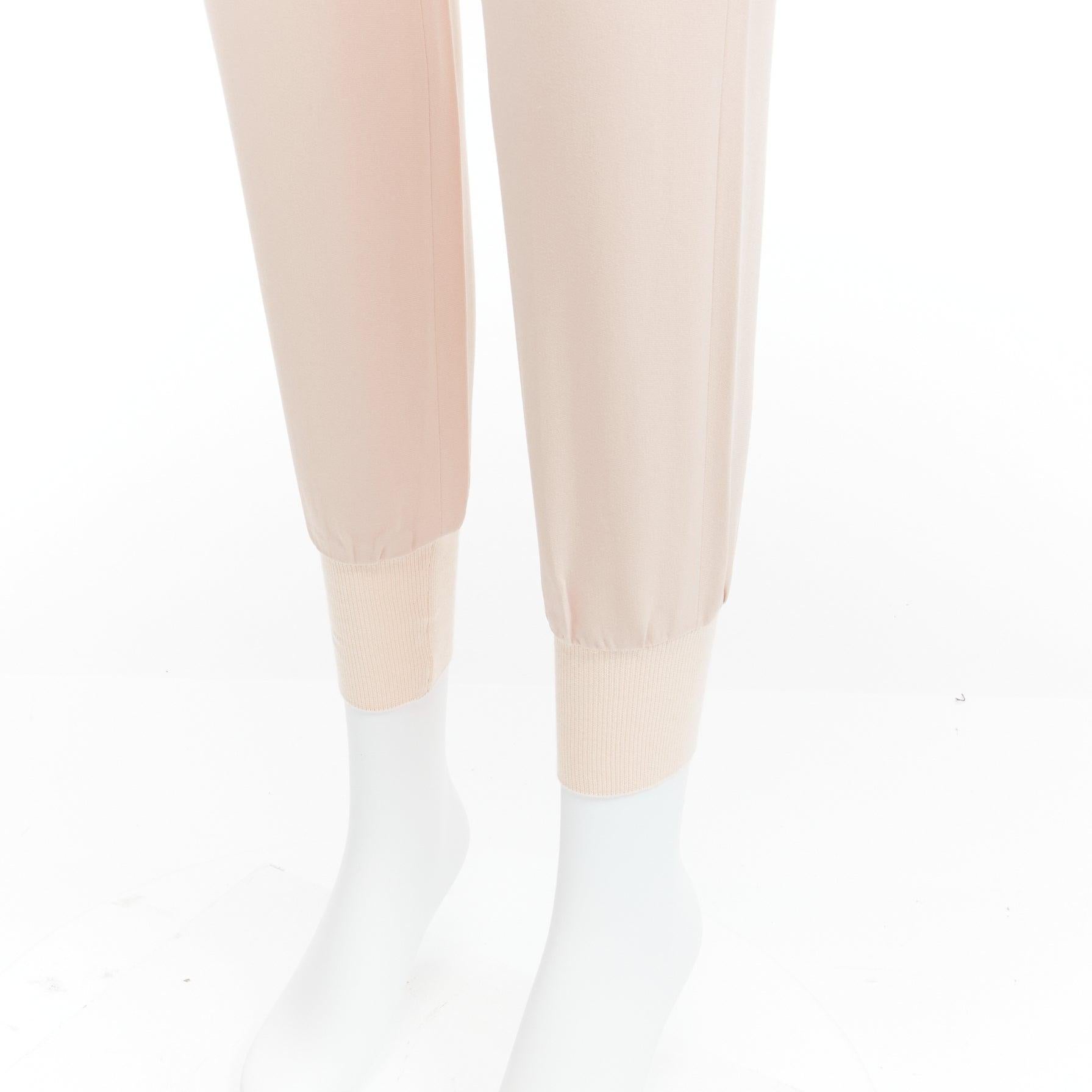 STELLA MCCARTNEY pink minimalist elastic waistband cropped jogger pants IT34 XXS
Reference: SNKO/A00293
Brand: Stella McCartney
Material: Viscose, Blend
Color: Pink
Pattern: Solid
Closure: Elasticated
Extra Details: Back elastic waistband.
Made in: