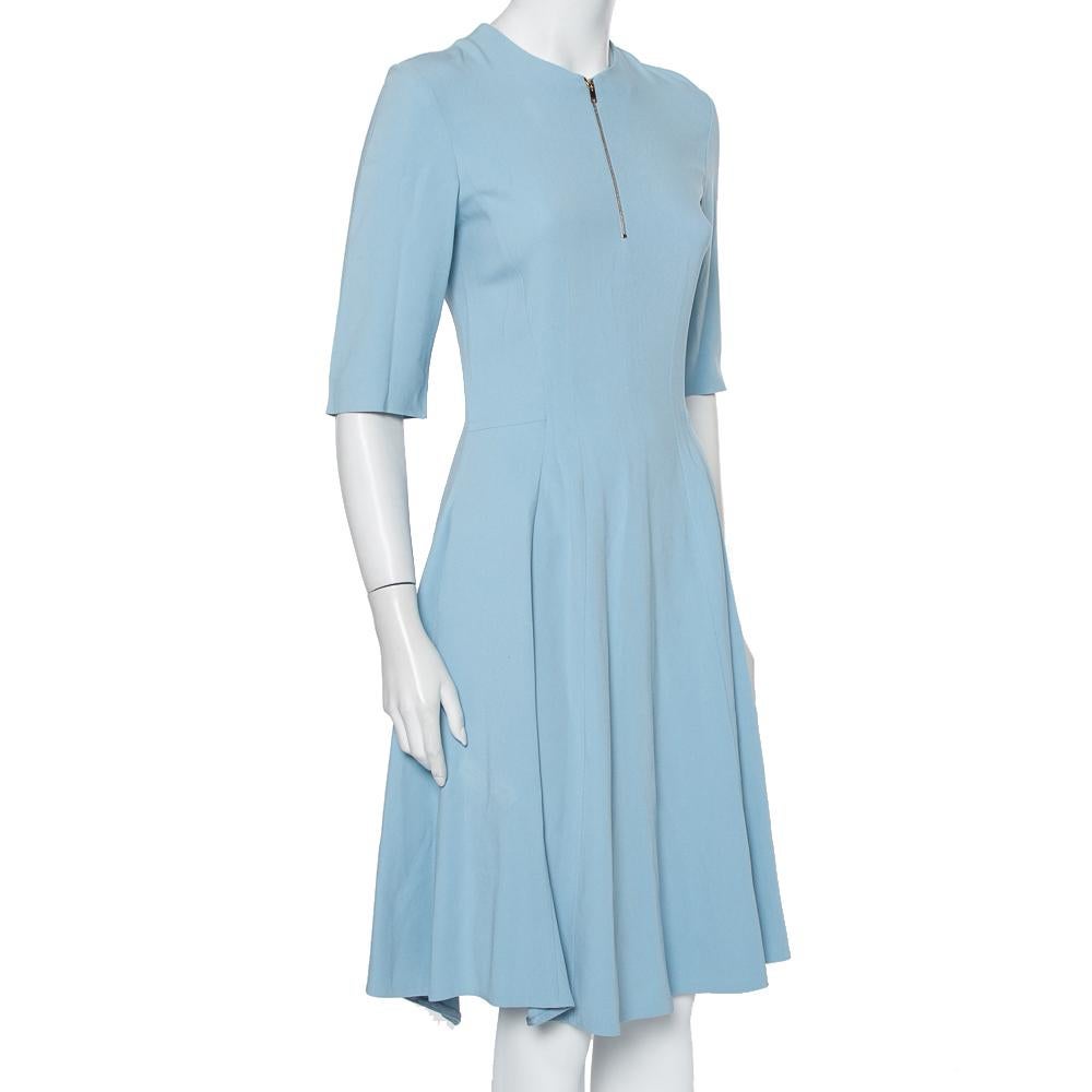 This Stella McCartney dress makes for an exquisite piece when paired with the right kind of accessories. Dress up for an occasion in this elegant blue dress designed just for you. Quality crepe fabric is cut masterfully to create a masterpiece like
