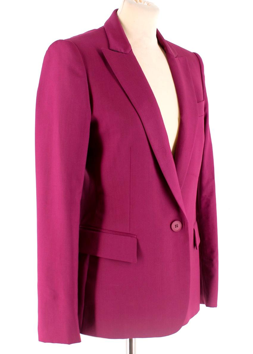 Stella McCartney - Purple Wool Suit

Trousers
- slim fit
- zip and hook fastening 
- zip detail at the ankles 
- open pockets on either side 

Blazer
-  padded shoulders
- two flap pockets on the front
- one slip pocket at the chest 
- tailored 
-