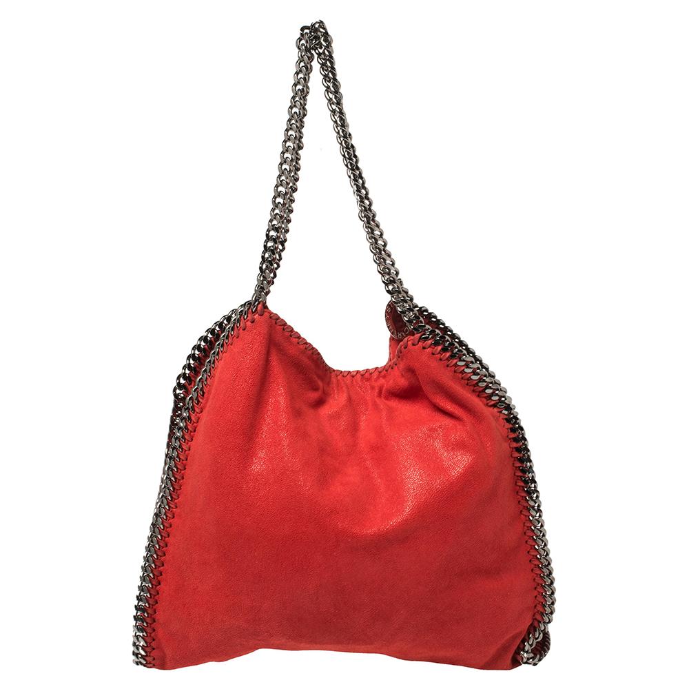 This Falabella tote from Stella McCartney will make the dream of countless women come true. Crafted from faux suede, it is durable and stylish. While the chain detailing elevate its beauty, the fabric-lined interior will dutifully hold all your