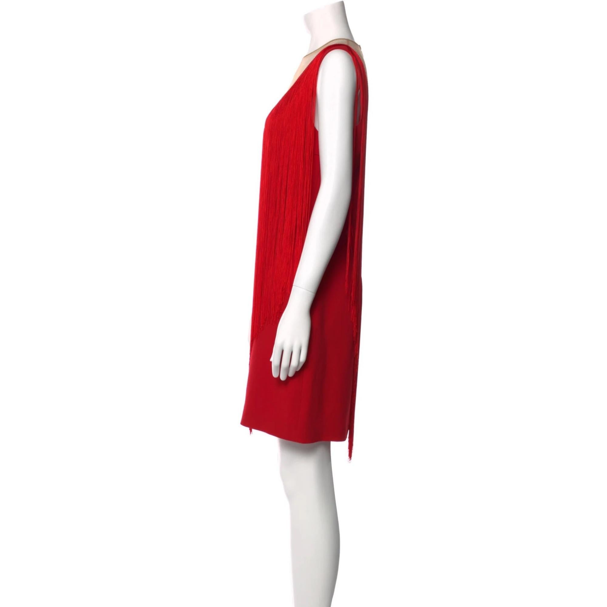 Stella McCartney Shift Dress. Red. Fringe Trim Accent. Sleeveless with Crew Neck. Concealed Zip Closure at Back.

COLOR: Red
MATERIAL: 49% Viscose, 48% Acetate, 3% Elastane; Lining 100% Silk; Combo 100% Polyamide; Combo 2 100% Viscose

SIZE: US6,
