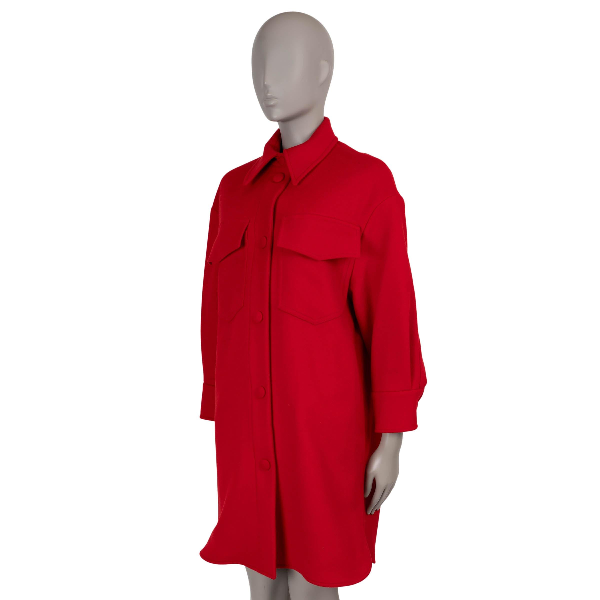 This 100% authentic Stella McCartney Kerry coat in red brushed wool (100%) offers a modern take on outerwear with its shirt-like silhouette. Designed with dropped shoulders, a spread collar, and two chest flap pockets, it combines a relaxed