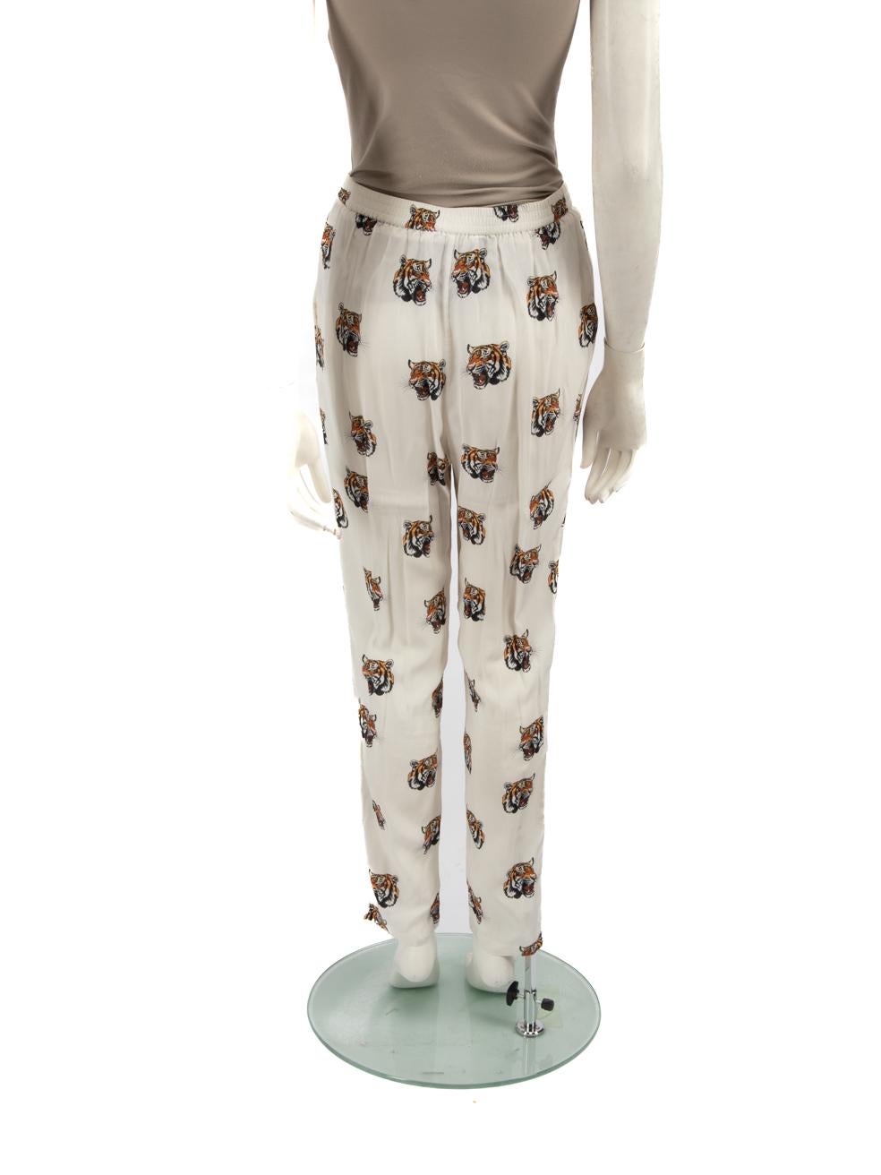 Pantalones de seda con estampado de tigre Stella McCartney Talla M Beige en venta