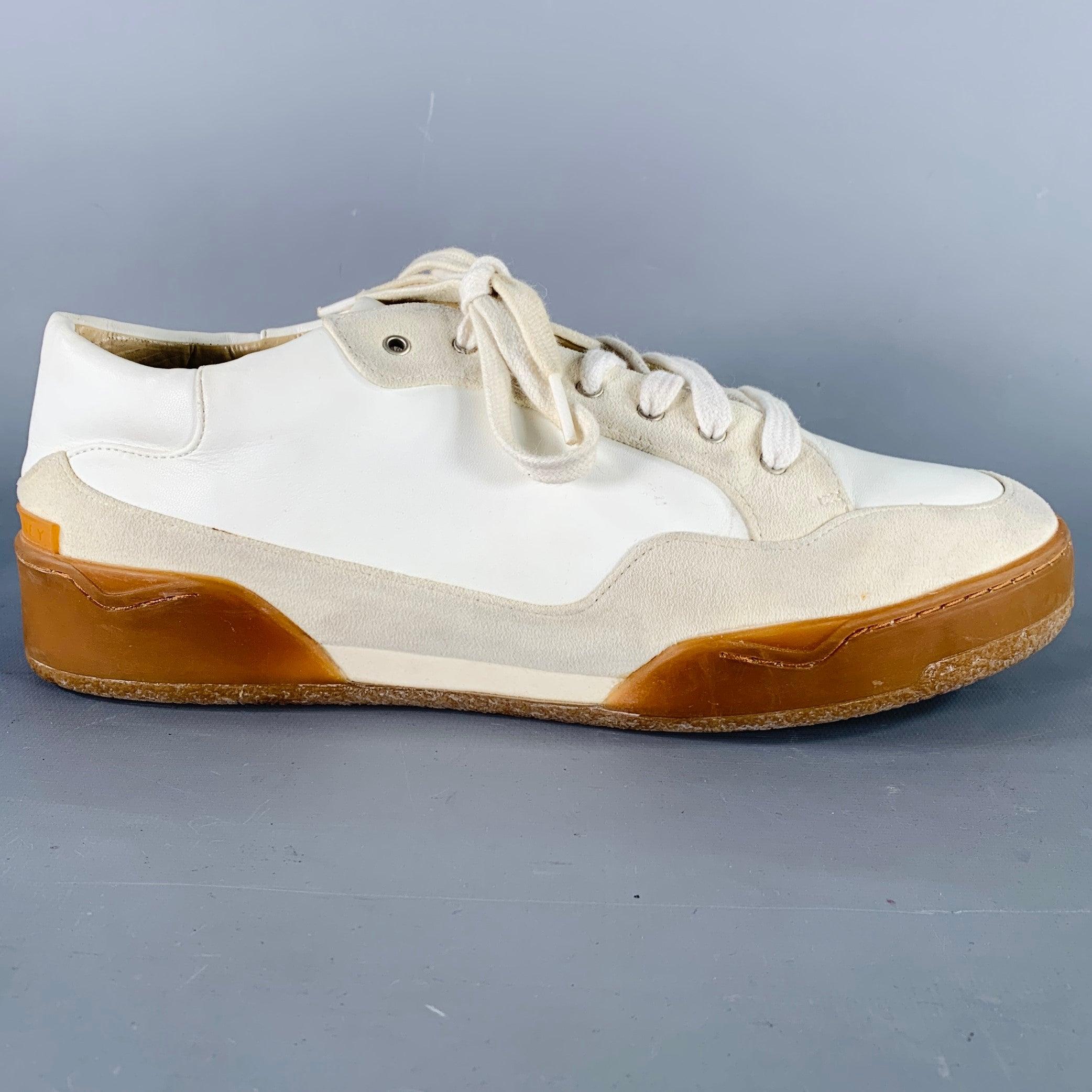 STELLA McCARTNEY sneakers
in a
white faux leather with cream faux suede featuring a low top style with platform, rubber sole, and lace-up closure.Very Good Pre-Owned Condition. Multiple minor marks. 

Marked:   460672 44Outsole: 11.5 x 3.75 inches 
