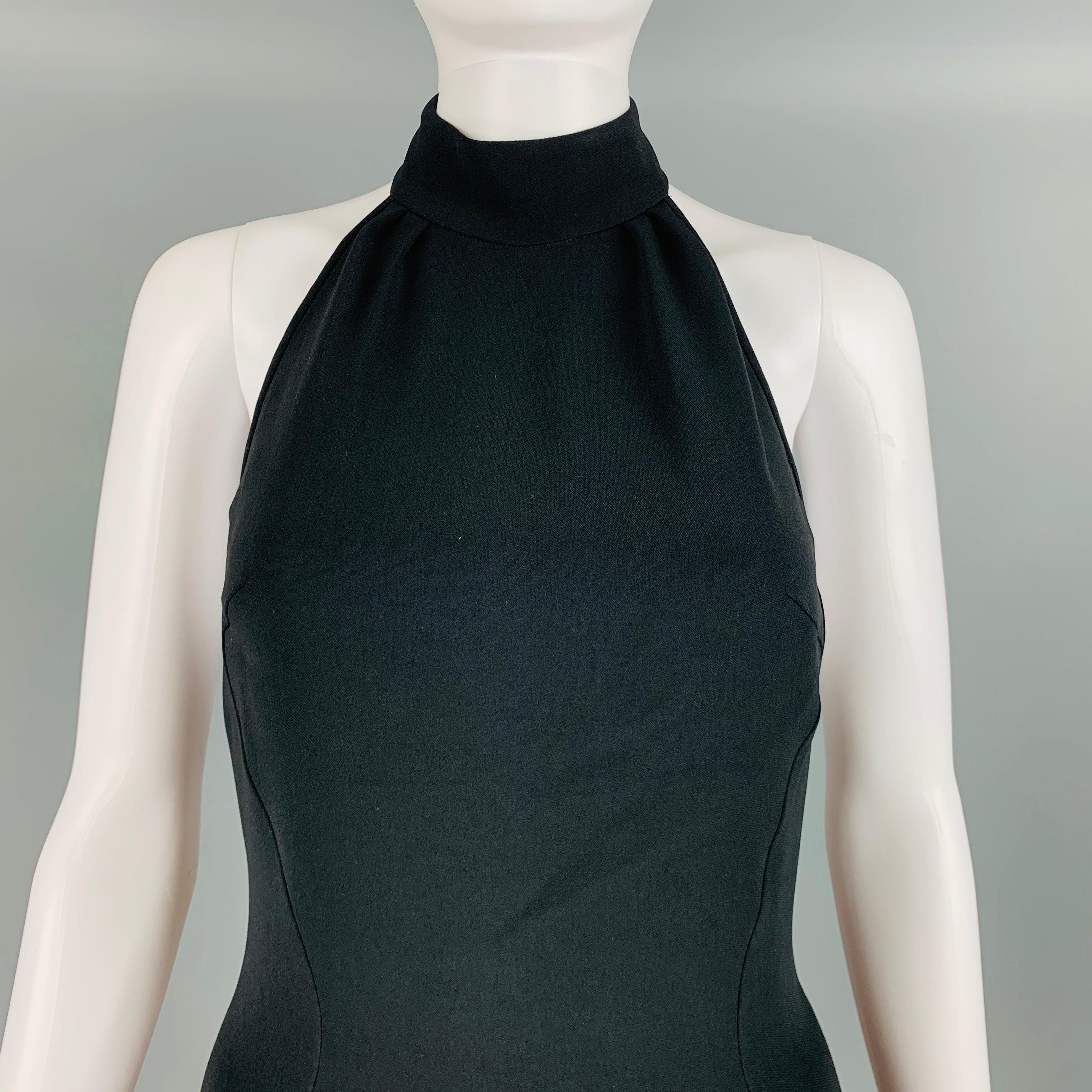 STELLA McCARTNEY above knee dress comes in a black viscose blend woven material featuring a halter design, tulip skirt, open back, and a side zip up closure. Very Good Pre-Owned Condition. Moderate signs of wear 

Marked:   38 

Measurements: 
 
