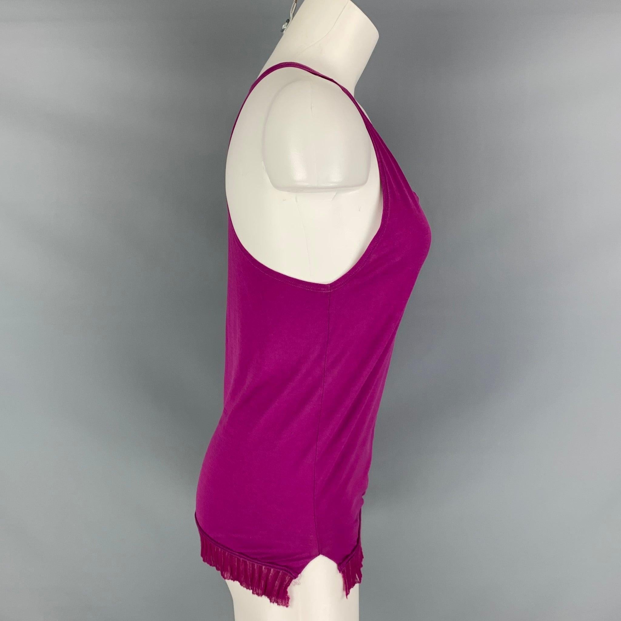 STELLA McCARTNEY tank top comes in a purple knit material featuring a knit ribbon hem detail. Made in Italy.Excellent
 Pre-Owned Condition. 

Marked:   38 

Measurements: 
  Bust: 34 inches Length: 25 inches  

  
  
 
Reference: 124442
Category: