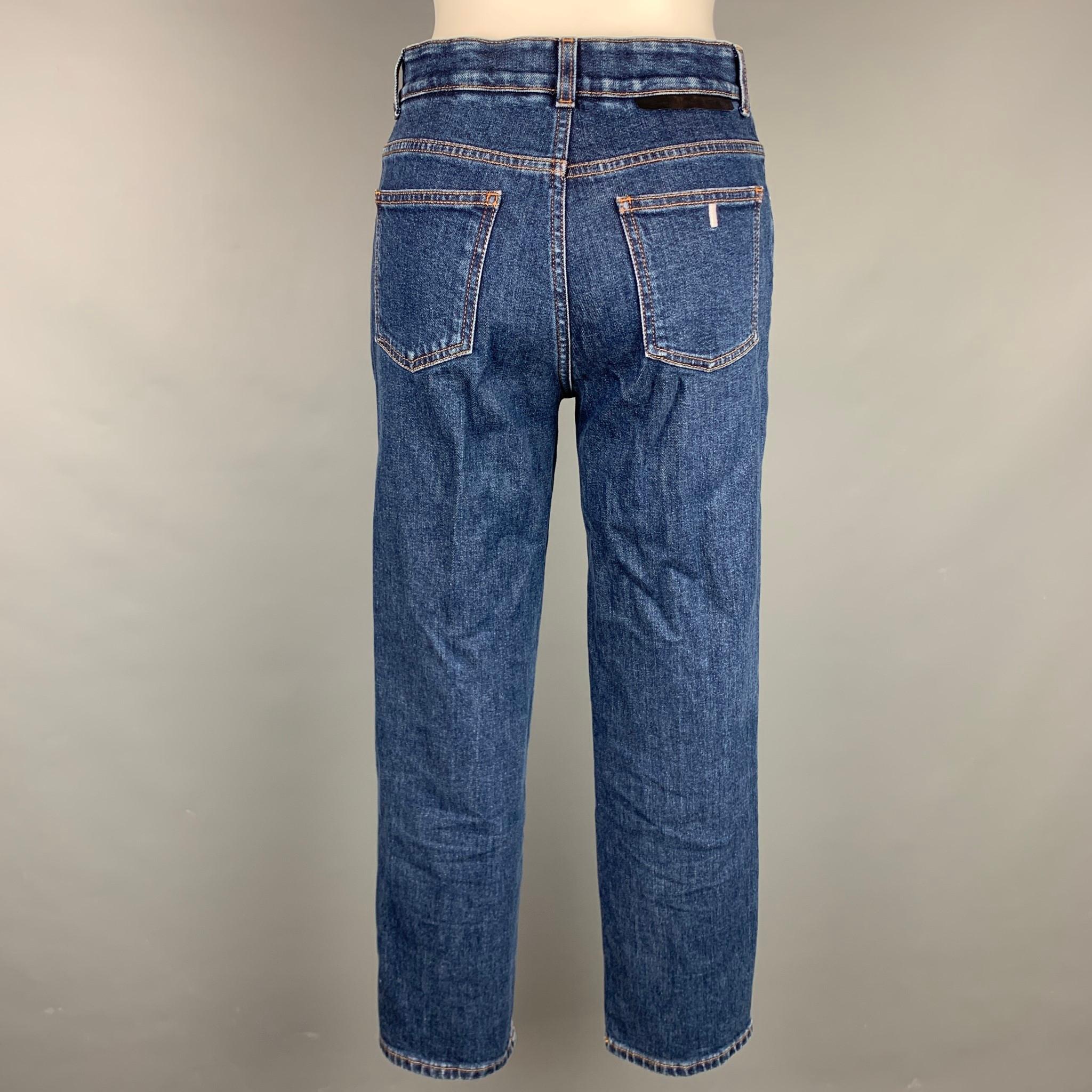 STELLA McCARTNEY jeans comes in a blue denim with heart patches featuring a high waisted style, contrast stitching, and a zip fly closure. Made in Italy.

Very Good Pre-Owned Condition.
Marked: 26

Measurements:

Waist: 28 in.
Rise: 10.5 in.
Inseam: