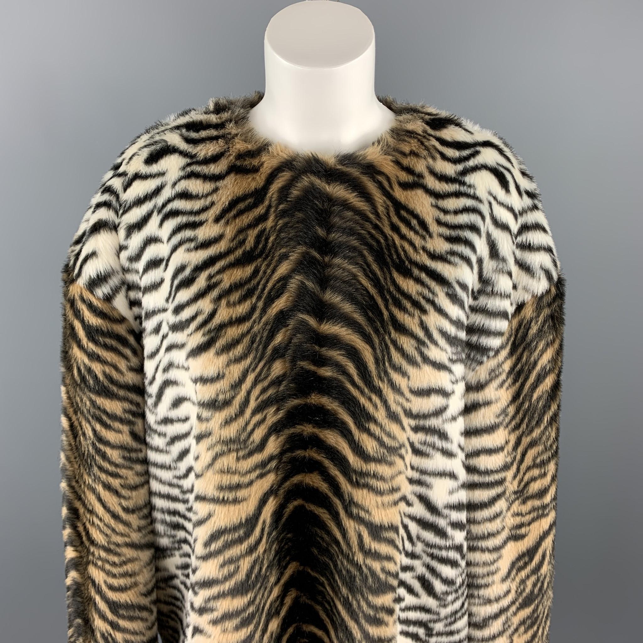 STELLA McCARTNEY sweater comes in a black & tan tiger print faux fur featuring a oversized fit and a back hook & eye closure. Made in Hungary.

Excellent Pre-Owned Condition.
Marked: 42

Measurements:

Shoulder: 23 in. 
Bust: 48 in. 
Sleeve: 21 in.