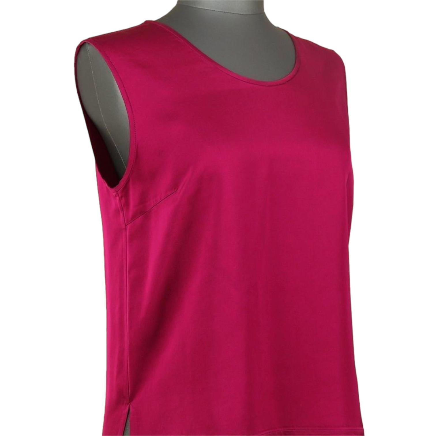 GUARANTEED AUTHENTIC STELLA MCCARTNEY CRANBERRY RED VISCOSE TUNIC TOP


Design:
* Round neck sleeveless top in a rich cranberry red color.
* Slip on.
* Beautiful longer length in the back.
* Unique and striking top.

Size: 38

Material: