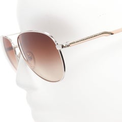 Stella McCartney SM3011 occhiali da sole con montatura argento nudo e lenti marroni