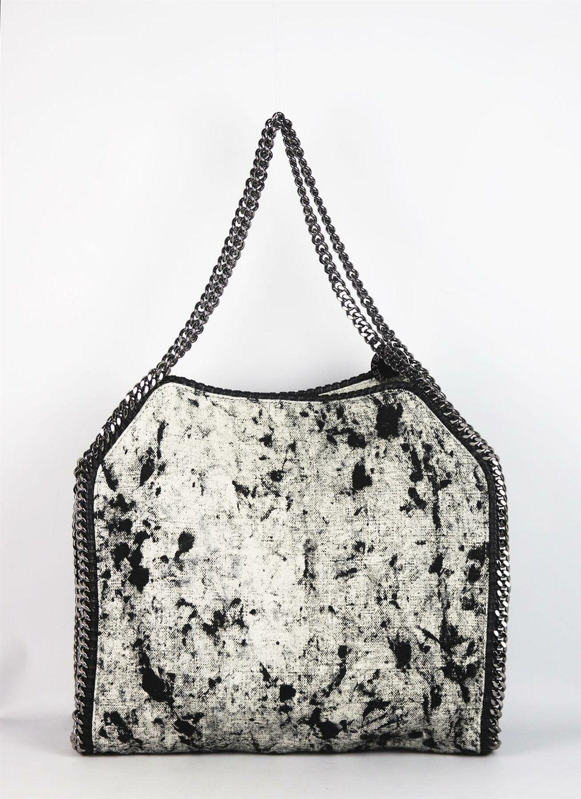 Stella McCartney is celebrated for her use sustainable materials - this medium 'Falabella' bag is crafted from the label's signature bleached denim, trimmed with whipstitched dark-silver chains, it's sized to hold your evening essentials and has a