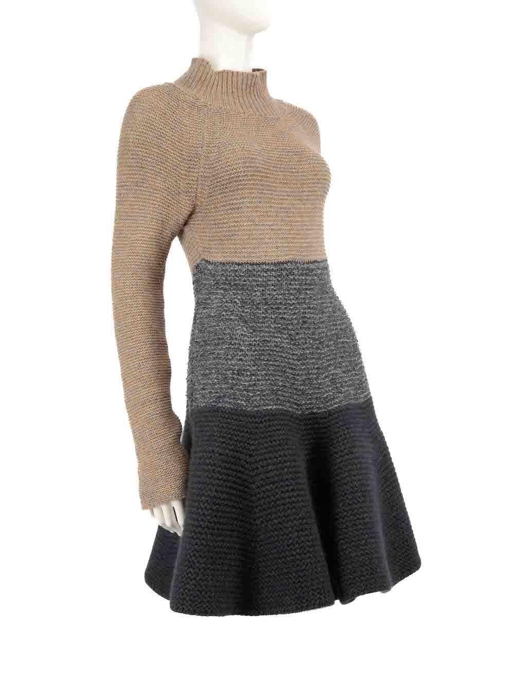 CONDITION is Very good. Hardly any visible wear to the dress is evident on this used Stella McCartney designer resale item.
 
 
 
 Details
 
 
 Multicolour- beige, navy
 
 Wool
 
 Knit dress
 
 Knee length
 
 Long sleeves
 
 Turtleneck
 
 Striped