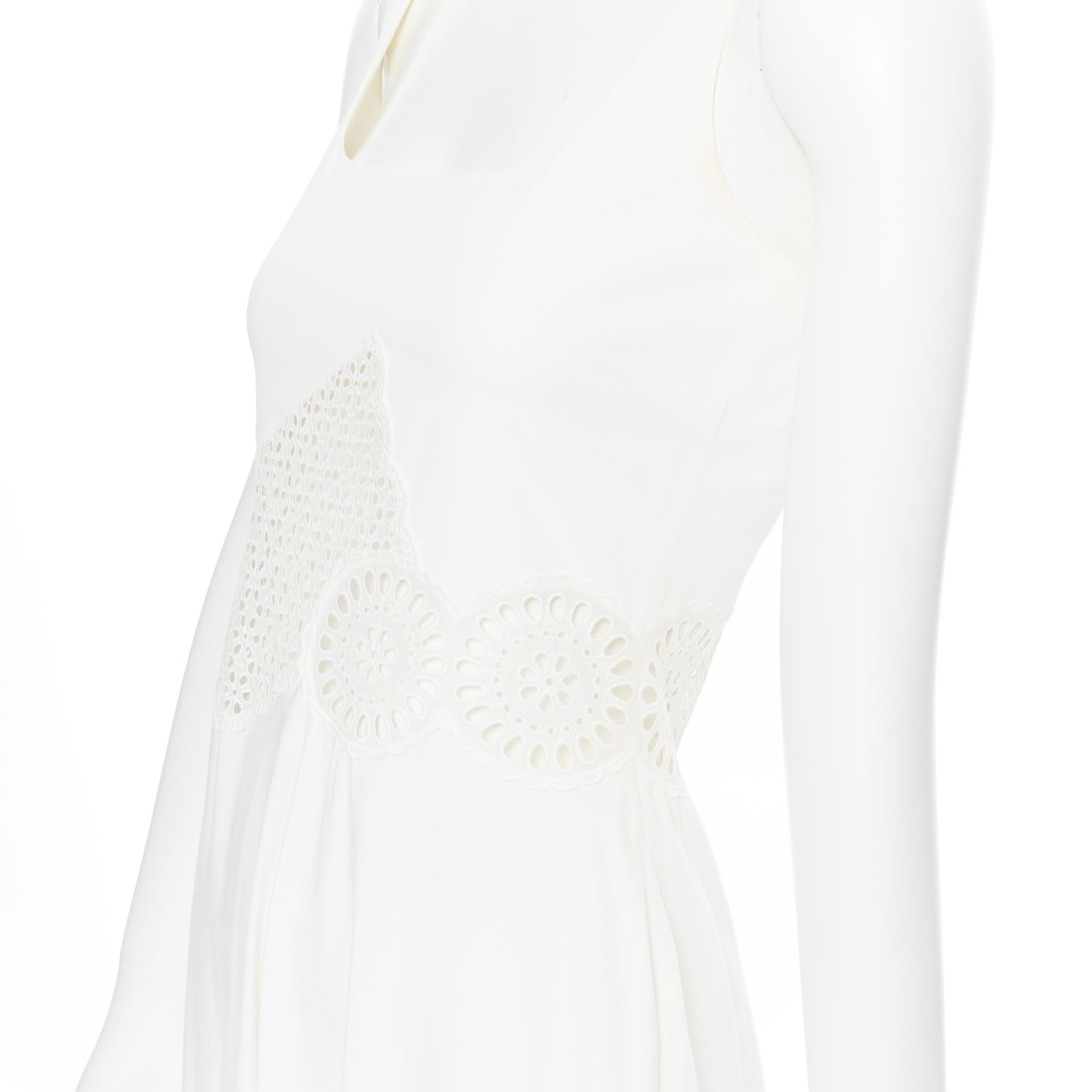 STELLA MCCARTNEY white cotton eyelet embroidery panel maxi dress IT34 XS
Brand: Stella McCartney
Designer: Stella McCartney
Model Name / Style: Cotton dress
Material: Cotton
Color: White
Pattern: Solid
Extra Detail: Eyelet detail at waist and at