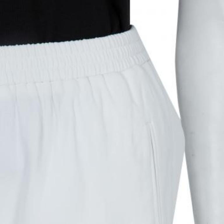 Stella McCartney Pantalones blancos con cremallera S Gris en venta