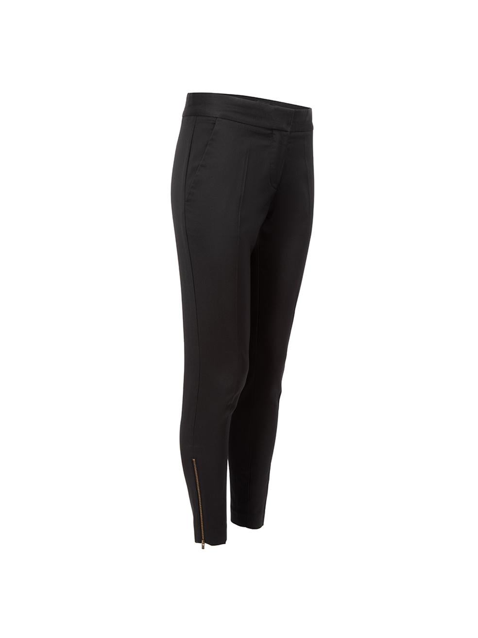 CONDITION is Very good. Hardly any visible wear to trousers other than a loose button at the front closure on this used Stella McCartney designer resale item. 
 
 Details
  Black
 Wool
 Slim fit trousers
 Low waisted
 Front zip closure with clasps