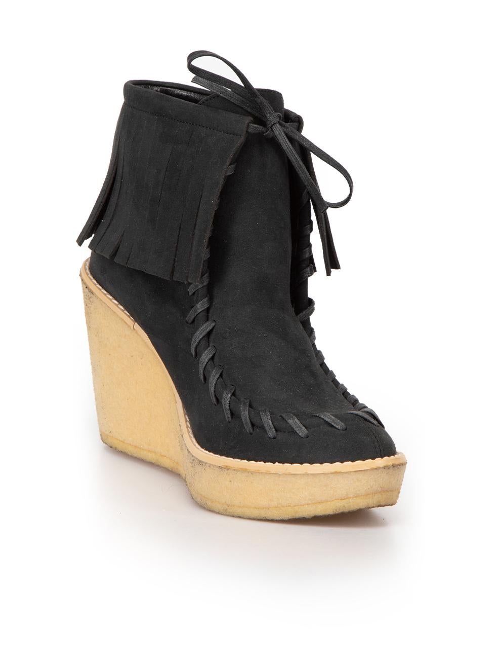 CONDITION is Good. Minor wear to boots is evident. Light wear to the rubber wedge sole with marks on both boots on this used Stella McCartney designer resale item. 



Details


Black

Vegan suede

Ankle boots

Weaved lace accent with tassels
