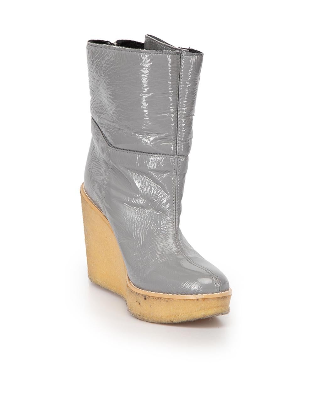 CONDITION is Good. Minor wear to boots is evident. Light wear to the rubber wedge sole with marks on both boots and small scuffs at both toes on this used Stella McCartney designer resale item. 



Details


Grey

Vegan patent leather

Ankle