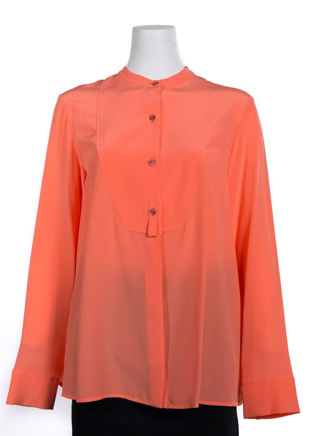 Brand New Stella McCartney Silk Tuxedo Blouse
Original Tag & Hanger Included
Retails in Stores & Online for $650
Size EUR 38 / US 6 Fits True to Size

 The Salmon Stella McCartney Tuxedo Blouse is a must-have. This silk made pop of color will