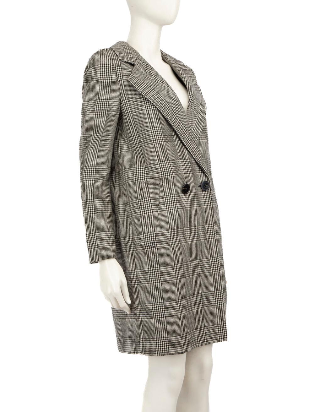 CONDITION is Very good. Minimal wear to the coat is evident, there is pilling to the lining on the back right panel of this used Stella McCartney designer resale item.
 
 Details
 
 
 Black and white
 
 Wool
 
 Coat
 
 Double breasted
 
 Mid-length