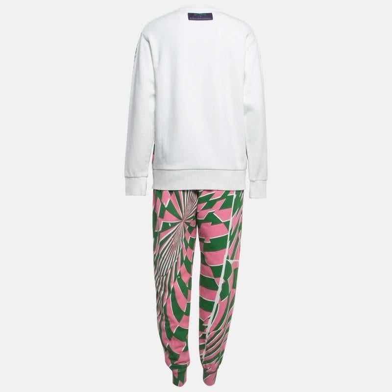 The Stella McCartney X ED Curtis sweatshirt and pants set features vibrant artistic designs that bring a unique flair to your wardrobe. Crafted from soft high quality cotton this matching ensemble combines comfort with striking visual appeal making