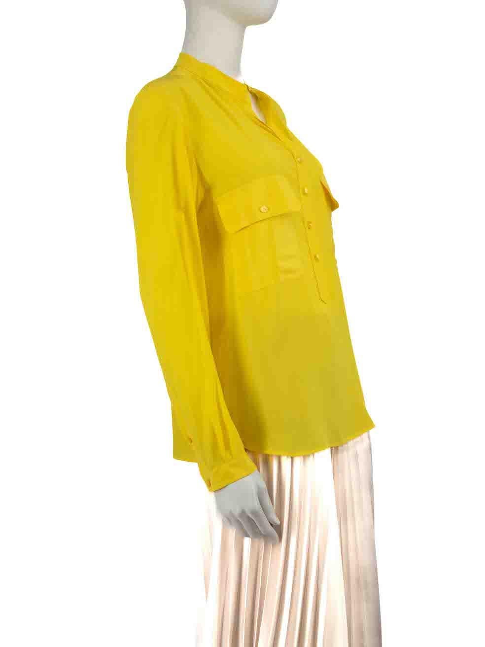 CONDITION is Very good. Minimal wear to blouse is evident. Minimal wear to the left sleeve cuff with a small mark on this used Stella McCartney designer resale item.
 
Details
Yellow
Silk
Blouse
Long sleeves
Button up fastening
Buttoned cuffs
2x