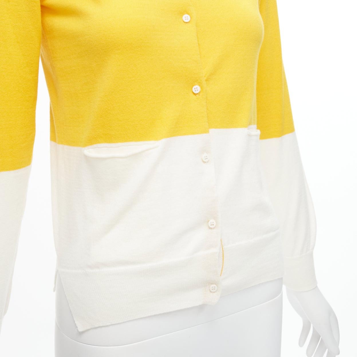 STELLA MCCARTNEY yellow white colorblock cotton pocketed cardigan sweater 12y
Reference: SNKO/A00239
Brand: Stella McCartney
Designer: Stella McCartney
Material: Cotton
Color: Yellow, White
Pattern: Solid
Closure: Button
Extra Details: Yellow and