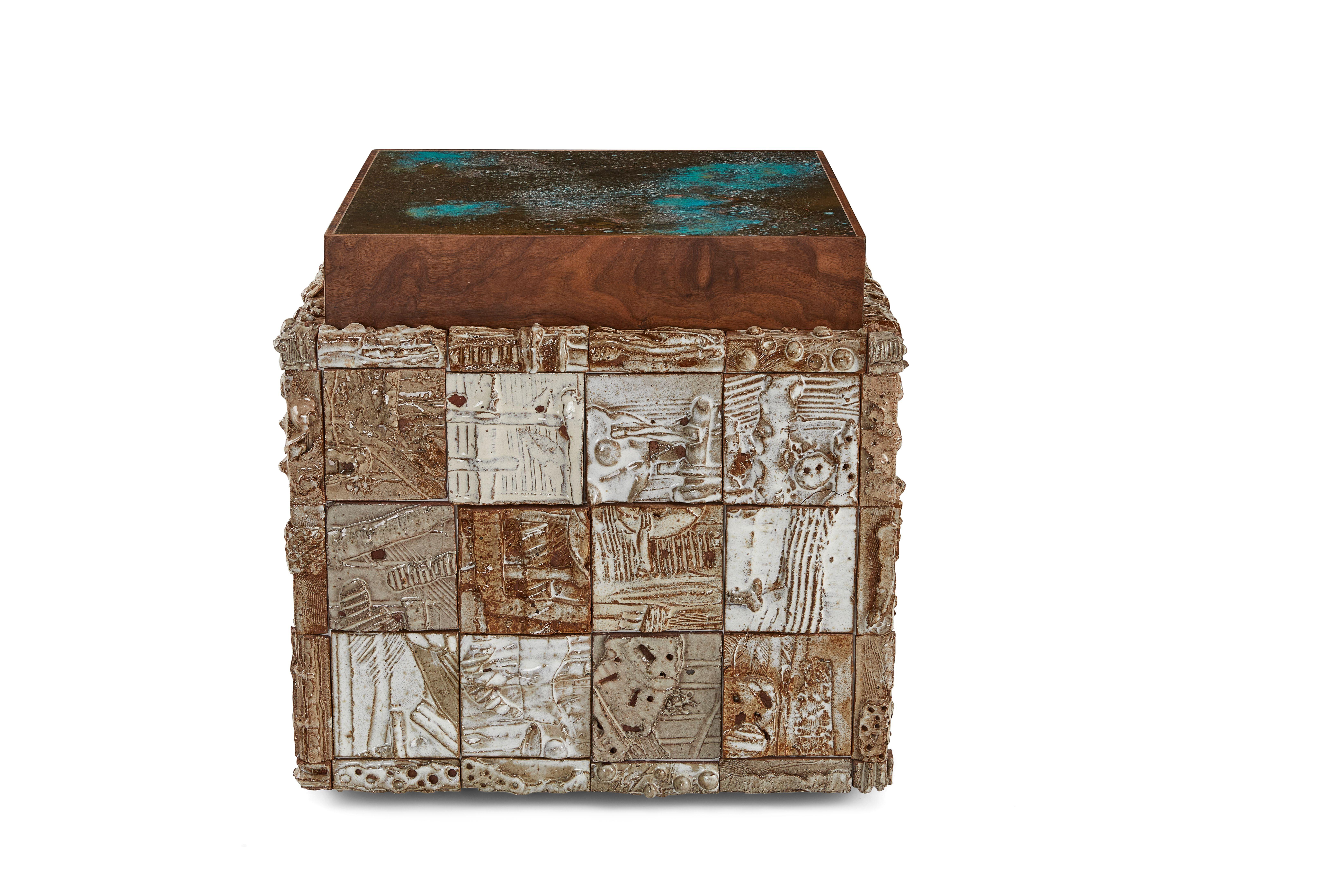 Stellar Cube Side Table by Egg Designs
Dimensions: 56 L X 56 D X 50 H cm 
Materials: Walnut Timber, Handmade Ceramic, Verdigris Solid Copper

Founded by South Africans and life partners, Greg and Roche Dry - Egg is a unique perspective in
