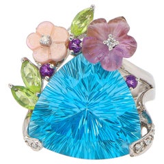 Stellar Cut Blue Topaz Ring with Carved Flowers Setting 18K White Gold