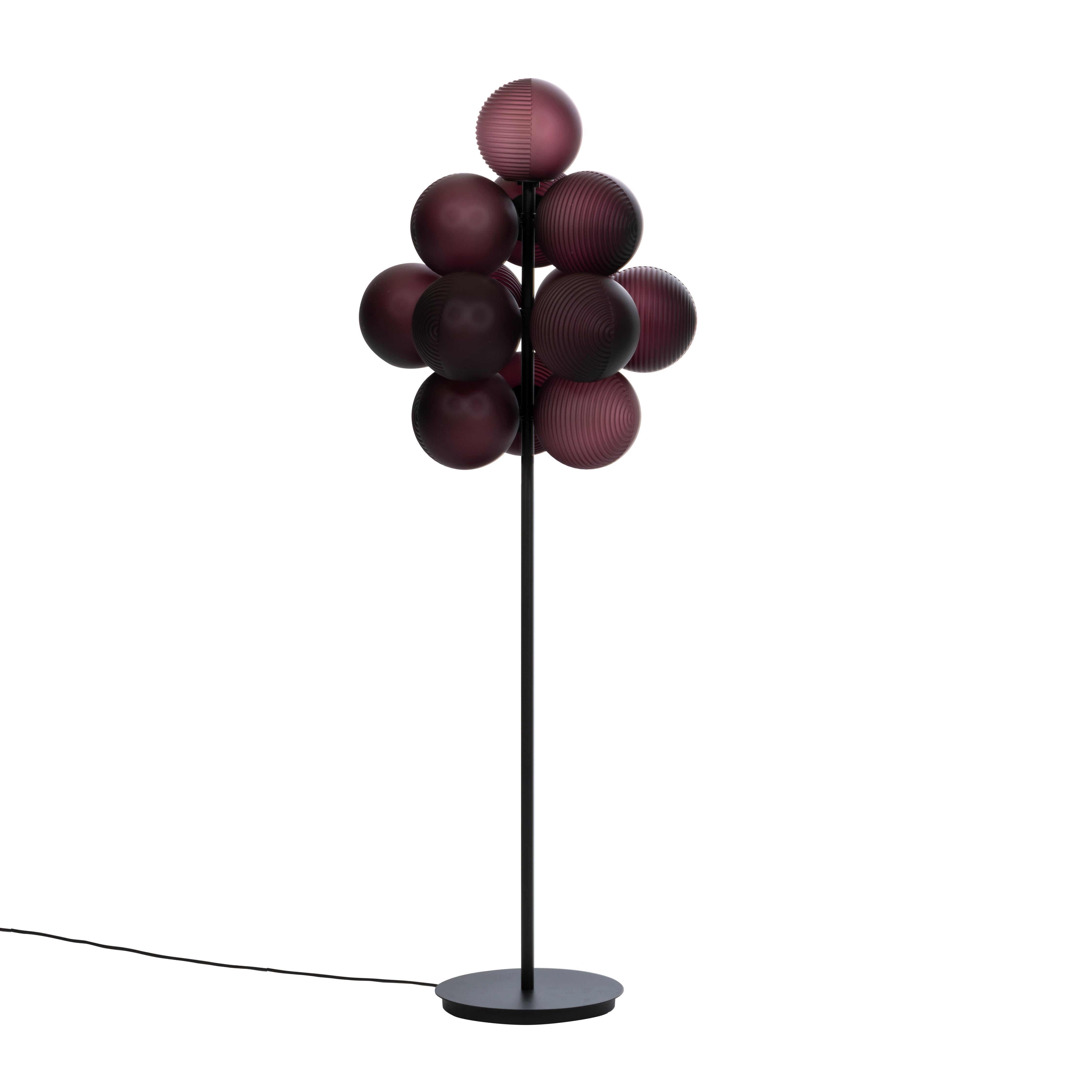 Stellar grape big aubergine acetato black floor light by Pulpo.
Dimensions: D61 x H158 cm.
Materials: handblown glass coloured, powder coated steel.

Also available in different finishes. Height can be customised. 

Raised up above the clouds