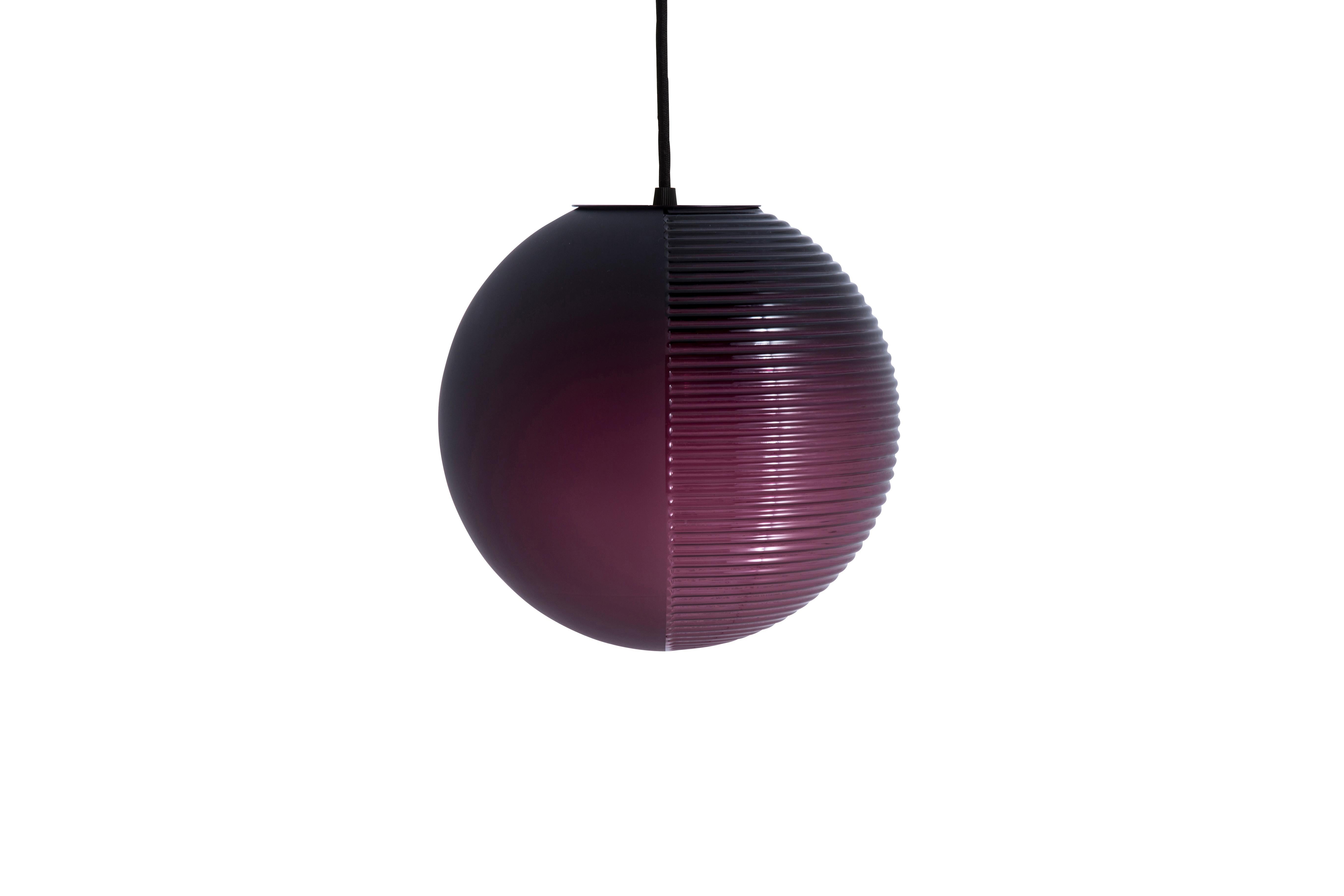 Stellar medium Aubergine Acetato Aubergine pendant by Pulpo.
Dimensions: D31 x H320 cm.
Materials: handblown glass coloured, stainless steel wire, textile cable.

Also available in different finishes: aubergine acetato aubergine, smoky grey