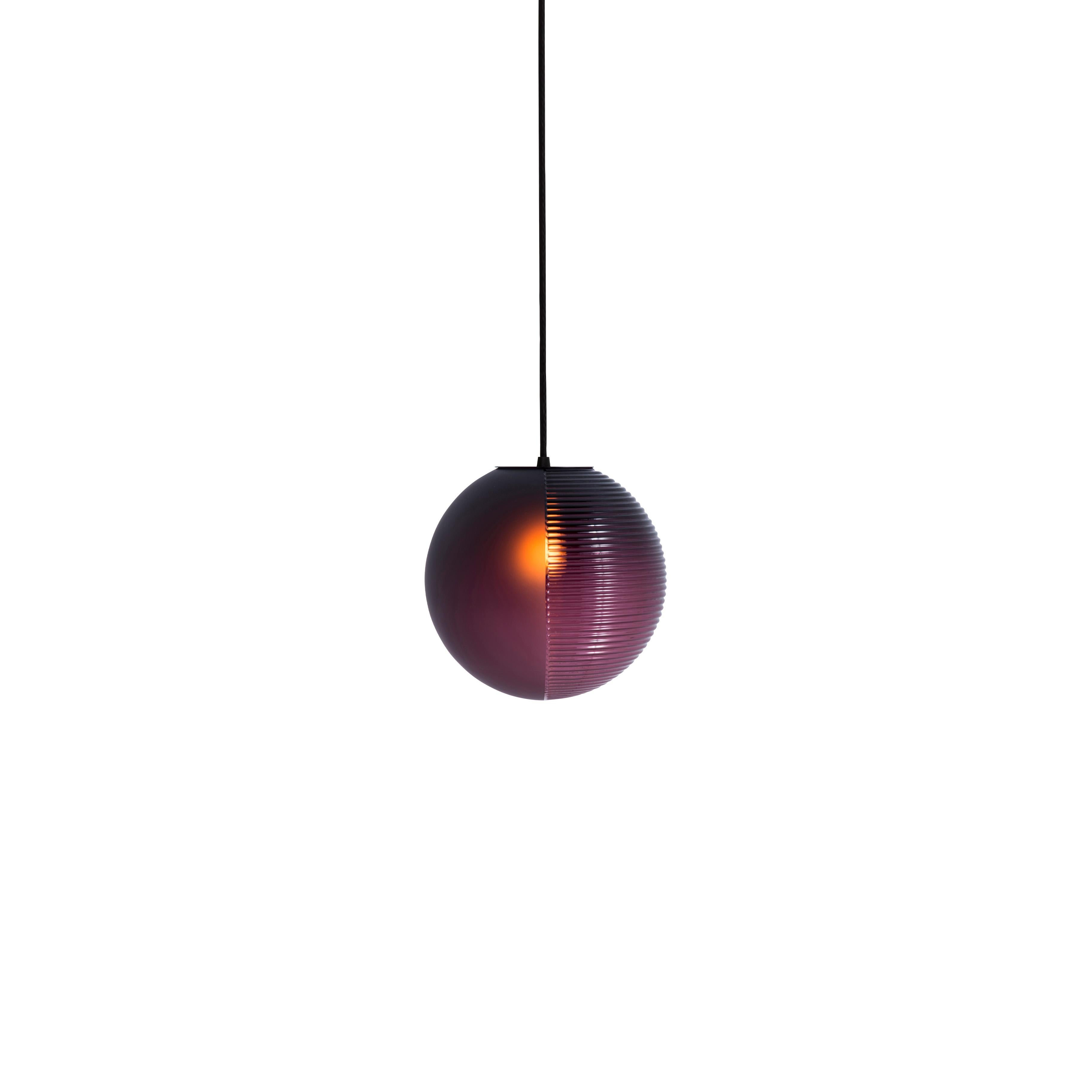 Stellar mini Aubergine Acetato Aubergine pendant by Pulpo.
Dimensions: D18 x H320 cm
Materials: handblown glass coloured, stainless steel wire, textile cable.

Also available in different finishes: aubergine acetato aubergine, smoky grey acetato