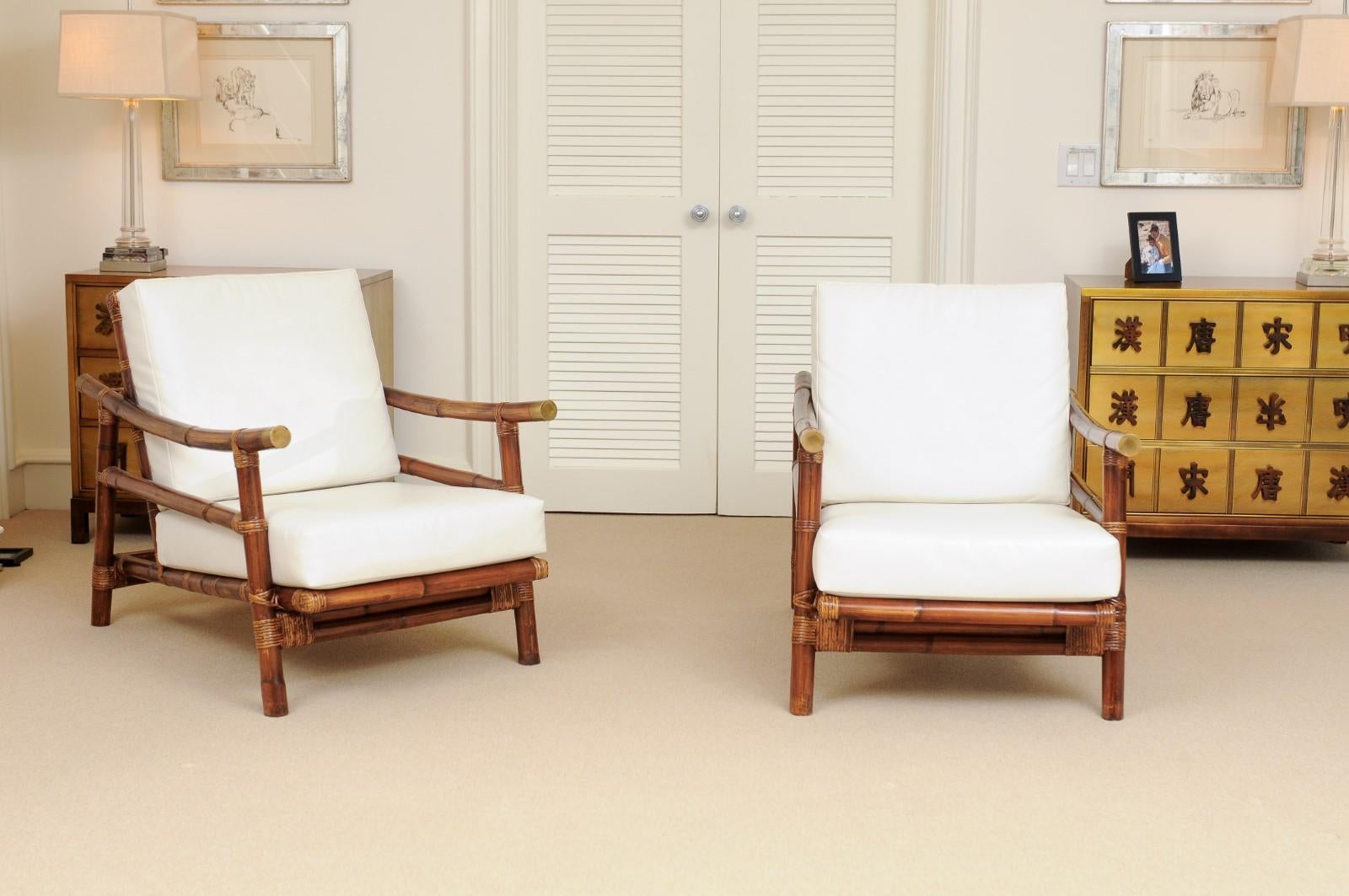 These magnificent lounge chairs are shipped as professionally photographed and described in the listing narrative: Meticulously professionally restored and upholstered. The chairs are installation ready. Expert custom upholstery service is